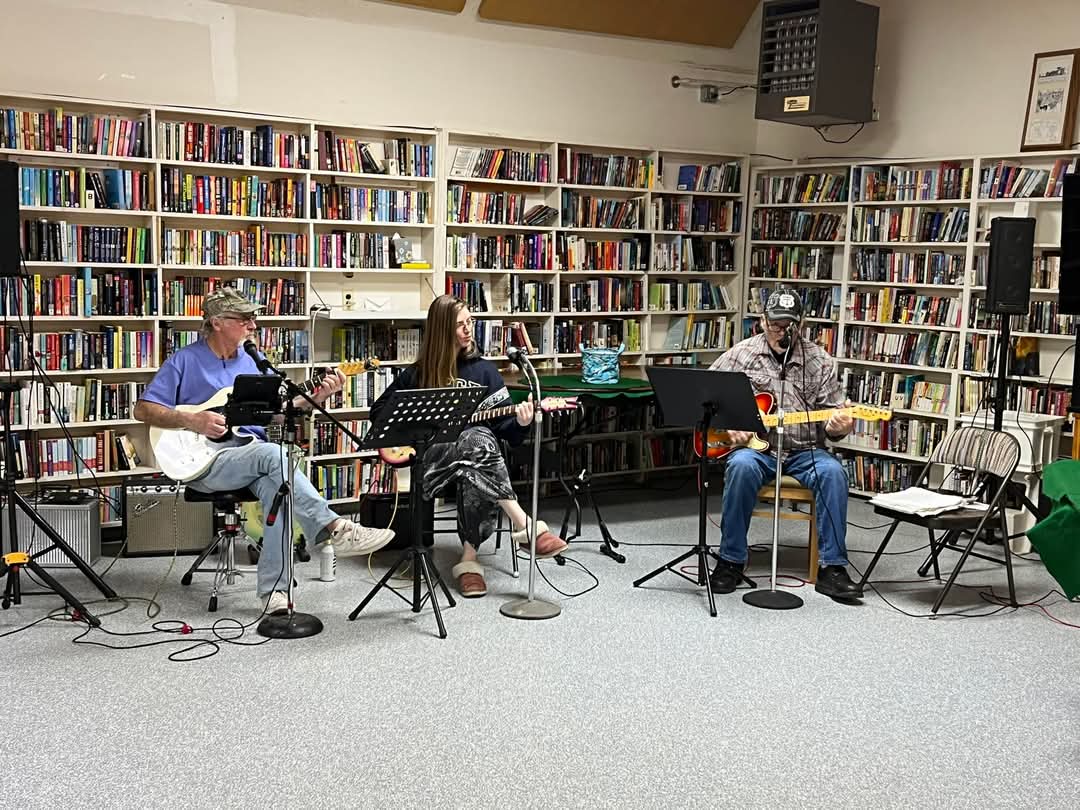 Members performing at the open mic night.